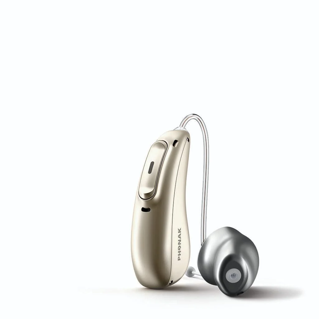 Modern behind-the-ear hearing aid on a clean white background