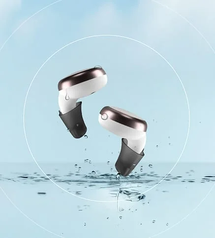 Modern hearing aids shown with water splash concept